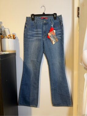 Women’s Mid Rise Flare Jeans in Medium Blue